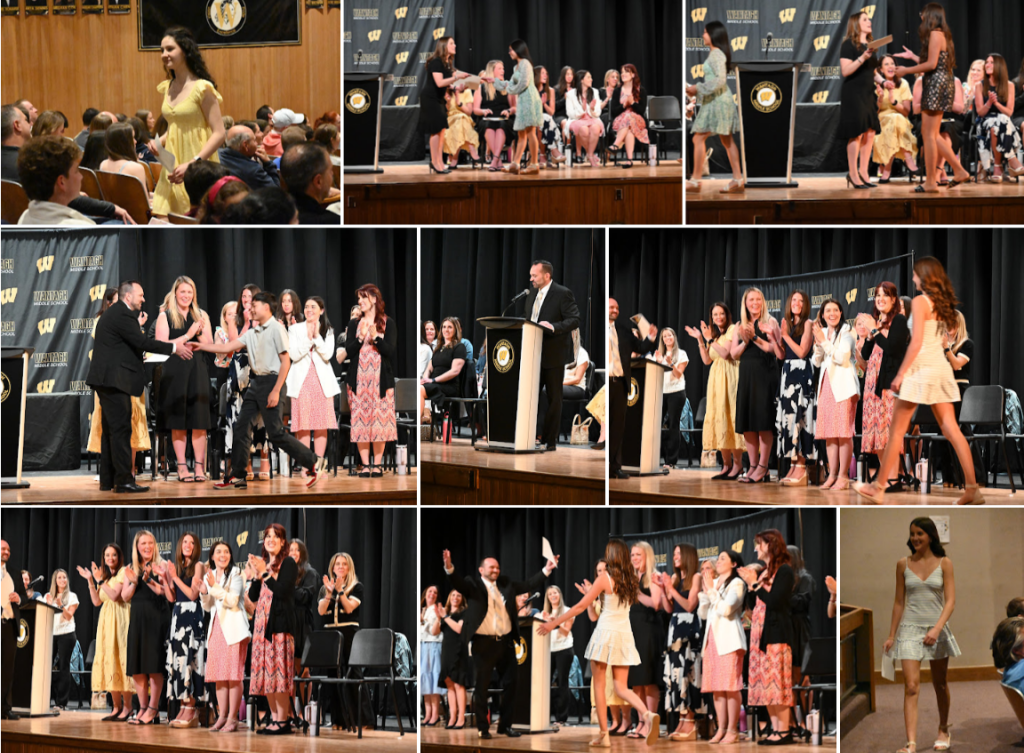 students receiving awards on stage